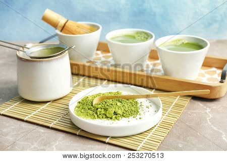 Plate With Powdered Matcha Tea And Chashaku On Table