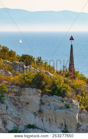 Nautical Navigation Post On Cliff On Croatian Island Solta