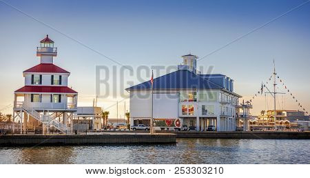 New Orleans, Usa - Nov 26, 2017: View Of The Iconic New Canal Lighthouse On The Left. Southern Yacht