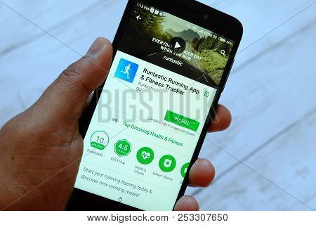 Bandar Seri Begawan,brunei - July 25th,2018 : A Male Hand Holding Smartphone With Runtastic App On A