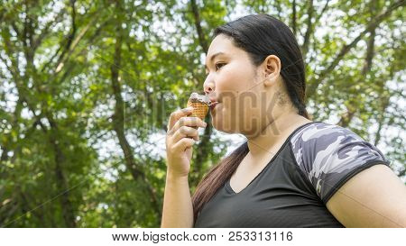 Fat Girl Eat Ice Cream In Close Up Face Feeling Delicious