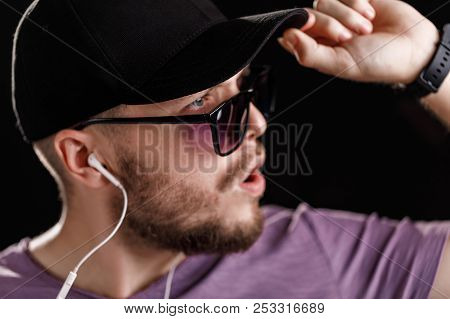 The Man Listening To Music In Headphones