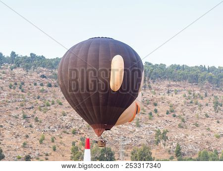 Afula, Israel, 3 August, 2018 : Hot Air Balloon In The Shape Of Head Of A Monkey Flies Up From The G