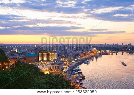 Skyline Of Kiev At Twilight. Podil, River Dnipro. Ukraine