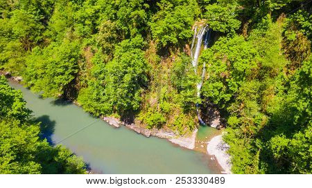 Drone View Of The Sochi River Gorge With Dense Forest And Orekhovsky Waterfall In Sunny Summer Day, 