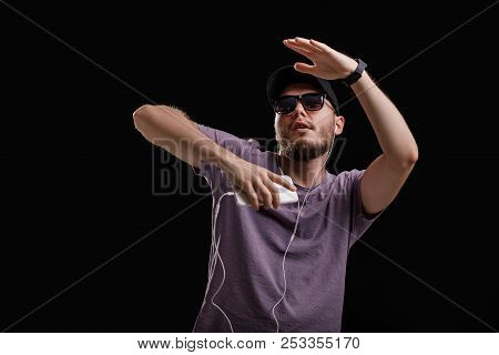 The Man Listening To Music In Headphones