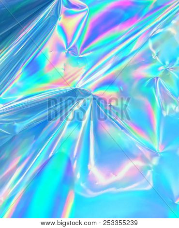 Holographic Iridescent Wrinkled Foil With Pastel Colors. Real Hologram Background Of Abstract Vivid 