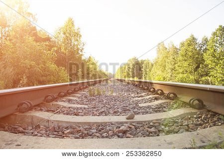 Rail Road In Forest Close Up With Solar Effect