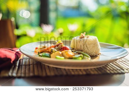Traditional Balinese Cuisine. Vegetable And Tofu Stir-fry With Rice