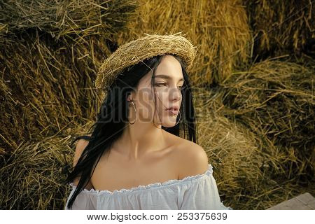 Woman With Long Brunette Hair On Dried Grass, Farm. Sensual Woman On Hay In Barn, Agriculture. Eco T