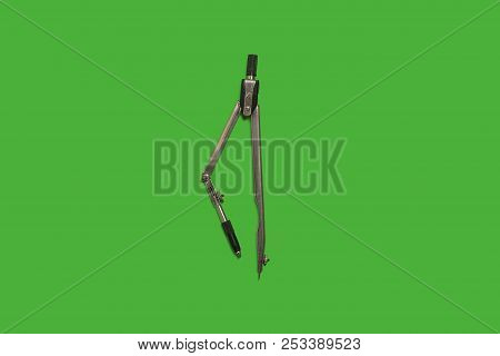 Calipers Lying On A Green Surface. Concept Of Office Supplies. Free Space For Advertising Text