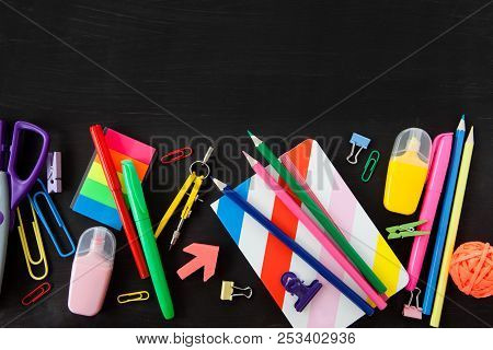 Colorful Office / School Supplies On A Black Background