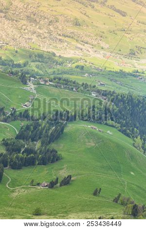 Green Grass Field On Top Of Rigi Kulm Luzern Switzerland With Alps Snow Mountain View A