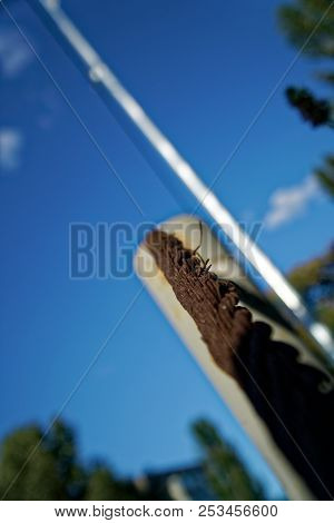 Thick Steel Rope Close Up. Bridge Fence Element. Detailed View. The Surface Of The Steel Cable Is Co