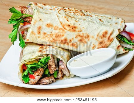 Eastern Traditional Shawarma Plate With Sauce.arabic Food.