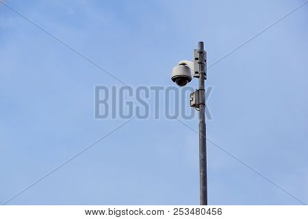 Outdoor Video Surveillance Camera , Dome Security Camera On The Street.