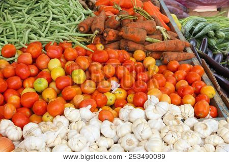 Local Vegetables Market In El Nido, Palawan, Philippines. Beans, Carrots, Garlic And Tomatoes.