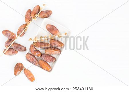 Dates Fruit In Ceramic Bowl White Background,dried Date Palm Fruits Top View