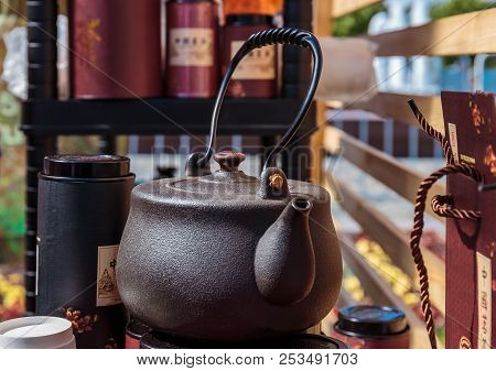 Japanese Herbal Tea Prepared In Brown Cast Iron Teapot With Organic Dry Herbs