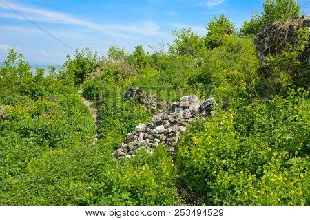 Ancient Ruins Of The Castle Of The Town Of Khust (dracula Castle). A Huge And Powerful Castle That P
