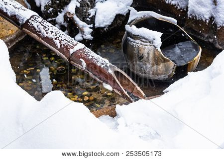 Japan Natural Mineral Hot Spring Called Onsen Cover By Snow In Japanese Ryokan On The Moutain Okuhid