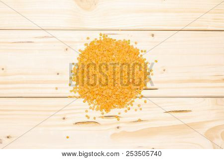 Lot Of Whole Raw Red Lentils Heap Flatlay On Natural Wood