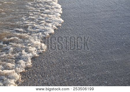 beautiful sea surf at sunset. background, texture