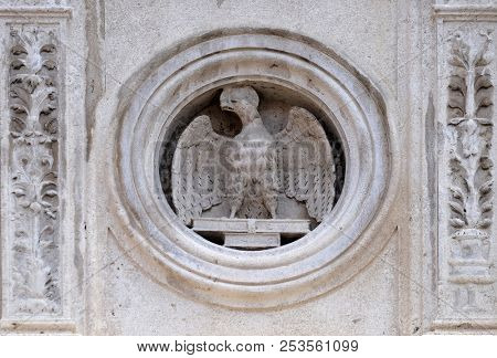 MODENA, ITALY - JUNE 04: Symbol of Saint John the Evangelist the marble pulpit by Jacopo e Paolo da Ferrara, dated 1501, Modena Cathedral, Italy on June 04, 2017.
