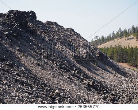 Textured Obsidian And Hardened Lava Rock On A Sunny Fall Day At The Big Obsidian Flow In The Newberr