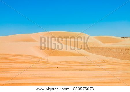 Sand Dunes Of Sahara Desert Near Ong Jemel In Tozeur,tunisia.