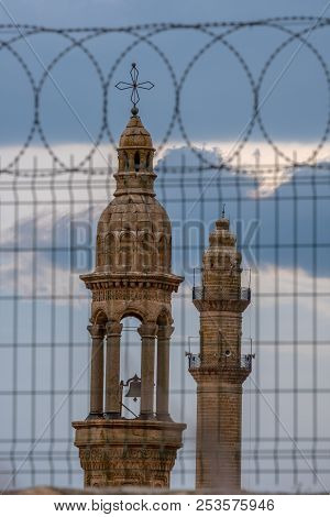 Minaret And Bell Tower  At Midyat, Mardin Turkey