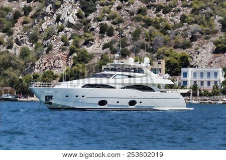 Yacht Starship Georgetown At The Pier Of Loutraki. In This Famous Town Often Come Expensive Yachts
