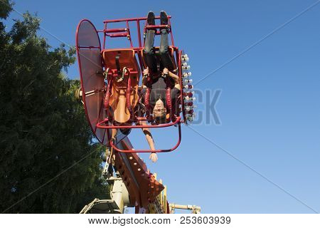 The Guy Sits On The Carousels In Gagarin Park, July 1, 2018, Russia, The City Of Sterlitamak
