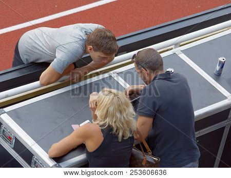 Stockholm, Sweden - Jun 10, 2018: Armand Duplantis And His Trainers (mother, Father) Preparing To Ju