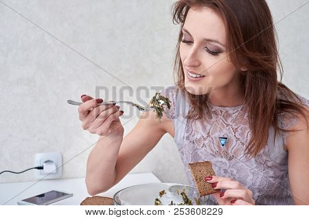 Beautiful Young Woman Eating Seaweed Salad. Dieting Concept. Healthy Food