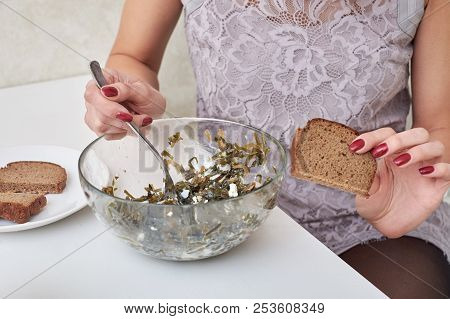 Beautiful Young Woman Eating Seaweed Salad. Dieting Concept. Healthy Food