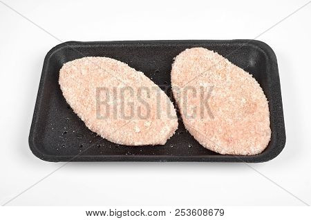 Raw Delicious Chicken Cutlet In Package. Isolated On A White Background.