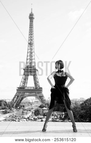 Girl Sexy Dancer In Front Of Eifel Tower In Paris, France. Beatuiful Woman In Dance Pose Like Eifel 