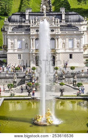 Ettal Abbey, Germany - August 12, 2018: Linderhof Palace With Fountain German: Schloss Linderhof Is 