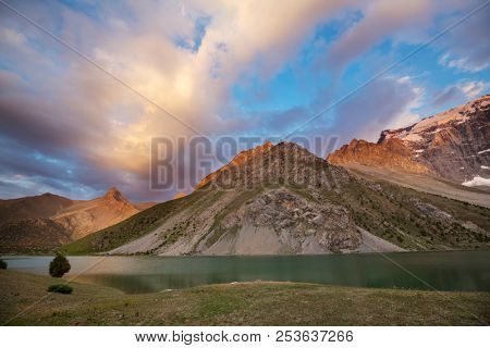 Beautiful serene lake in  Fann mountains (branch of Pamir) in Tajikistan.