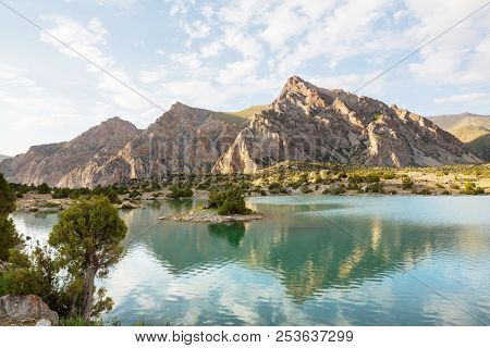 Beautiful serene lake in  Fann mountains (branch of Pamir) in Tajikistan.