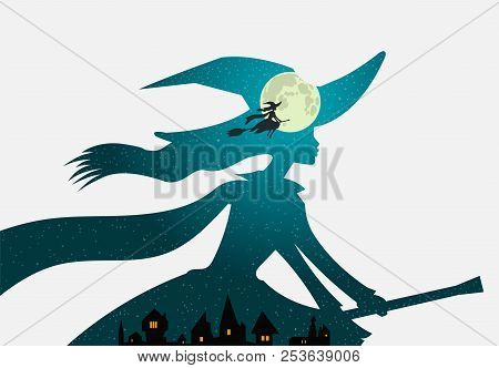 Halloween Theme: Beautiful Witch Flies On Broomstick Over Town Buildings Against The Background Of D