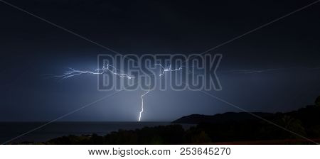 Lightning During A Storm On The Sea At Nignt