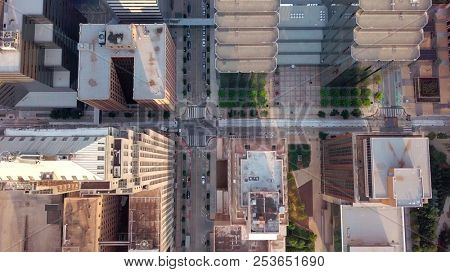 Aerial straight down view of modern city and skyscrapers.