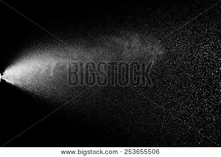Abstract Splashes Of Water On Black Background.