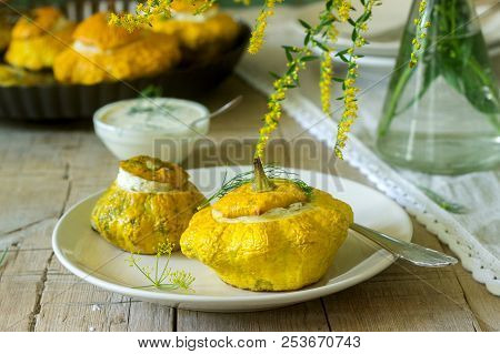 Pattypan Squash Or Pumpkins Stuffed With Ricotta With Basil And Dill And Served With Sour Cream Sauc