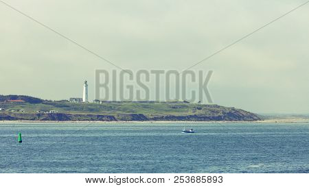 Beautiful Seascape Sea Horizon And Coastline With Lighthouse Hirtshals, Denmark, Europe.