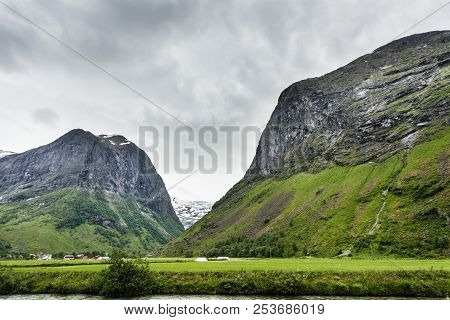 Tourism Vacation And Travel. Mountains Landscape At Summer With Beautiful Grren Valley, Stryn Munici
