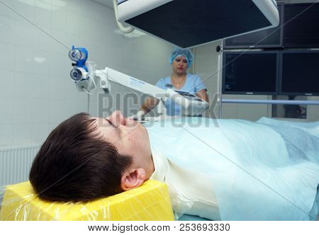 MOSCOW, RUSSIA - November 09, 2012: The patient before the operation on an x-ray machine. The endovascular surgery room in the city clinical hospital in Moscow.