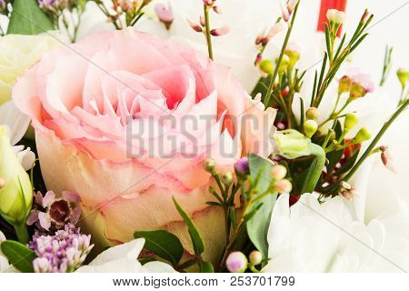 Closeup View Of Roses In Bouquet On White Background